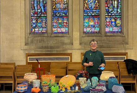 Sally Roach at the Dutch Church with baskets